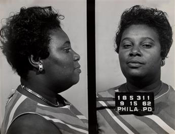 (AMERICAN CRIME) Thick white binder containing 400 mug shots of men and women who were picked up in Philadelphia for a range of petty c
